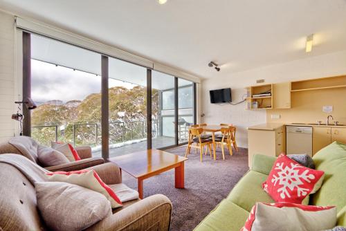 Η κουζίνα ή μικρή κουζίνα στο Snow Ski Apartments 18