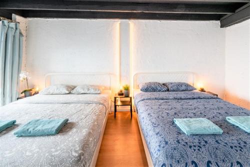 מיטה או מיטות בחדר ב-Saint Pauls Apartments