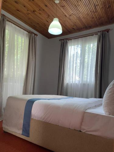 Ένα ή περισσότερα κρεβάτια σε δωμάτιο στο Feel & Live Hotel Villas Restaurant Sapanca
