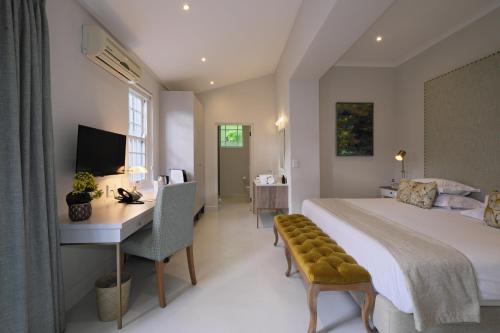 Katil atau katil-katil dalam bilik di Chapter House Boutique Hotel by The Living Journey Collection