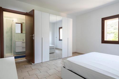 Posteľ alebo postele v izbe v ubytovaní Appartamento Girasole
