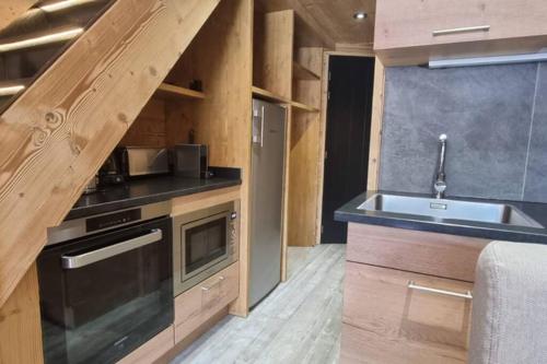 Kuchnia lub aneks kuchenny w obiekcie Val Thorens - SILVERALP - Duplex avec 3 chambres