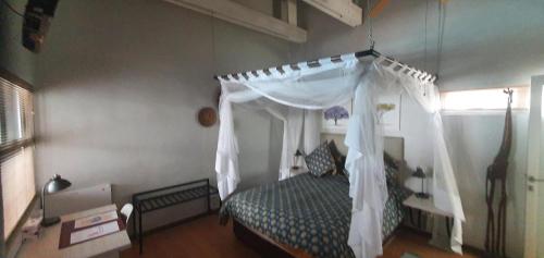 Katil atau katil-katil dalam bilik di Vondelhof Guesthouse