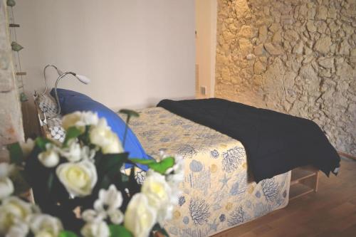 Posteľ alebo postele v izbe v ubytovaní Reginella Centro Storico