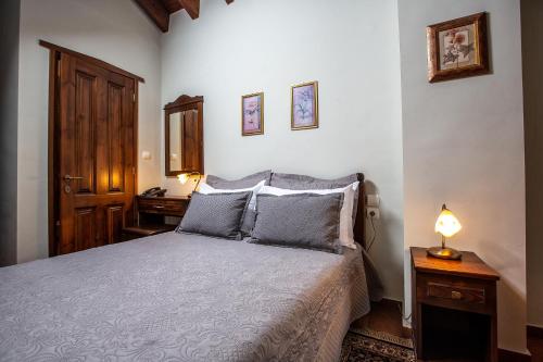 Postel nebo postele na pokoji v ubytování La Noi Guesthouse