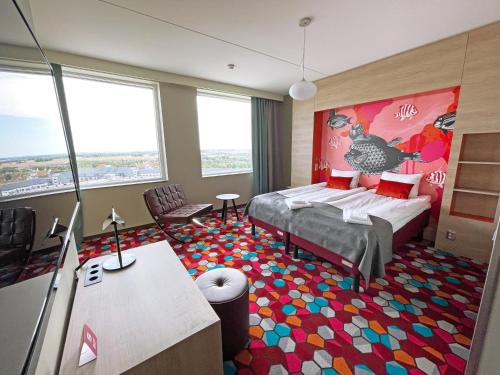 Postel nebo postele na pokoji v ubytování Motel L Lund