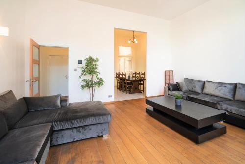 a living room with a couch and a coffee table at Saint Pauls Apartments in Antwerp