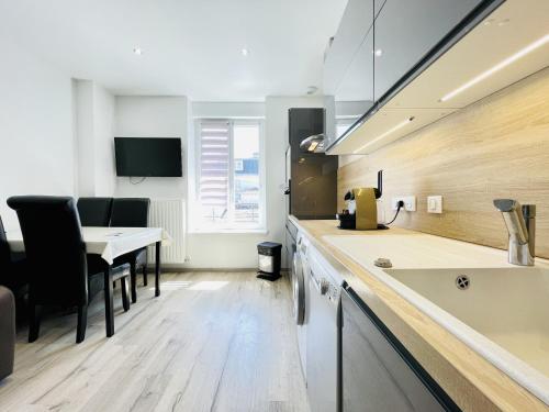 Η κουζίνα ή μικρή κουζίνα στο Residence Louis Quartier Gare