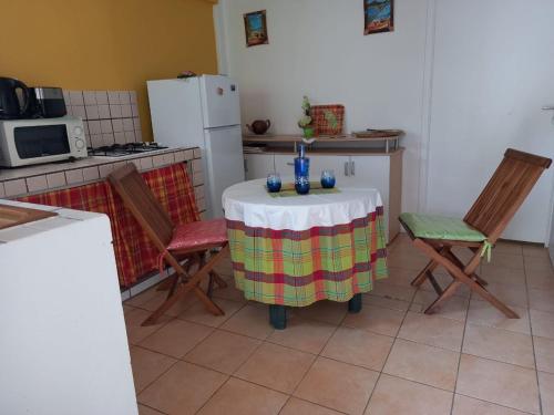 Kuchyň nebo kuchyňský kout v ubytování Petit appartement cosy près des plages