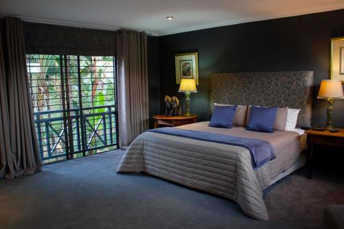 Katil atau katil-katil dalam bilik di Koru Guesthouse