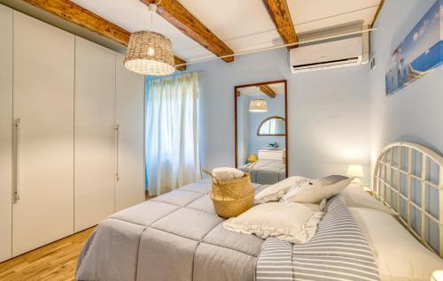 a bedroom with a large bed in a room at Casa Vacanze con piscina - Villa Bentivoglio in Morrovalle