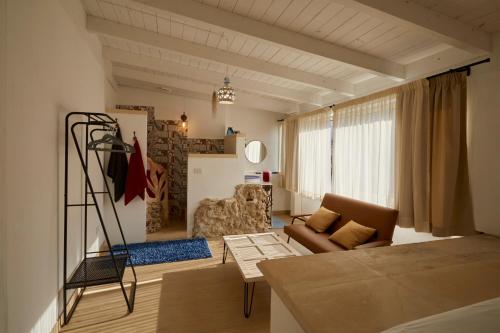 A bed or beds in a room at Upstairs - Skylight