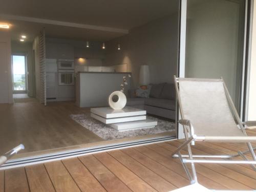 Et opholdsområde på Très bel appartement de 55 m2 face mer avec superbe vue sur la baie de la Baule