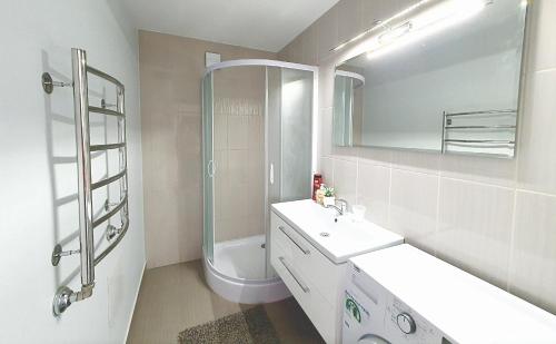 Vonios kambarys apgyvendinimo įstaigoje Cozy 3 bedroom apartament in town centre of Joniškis