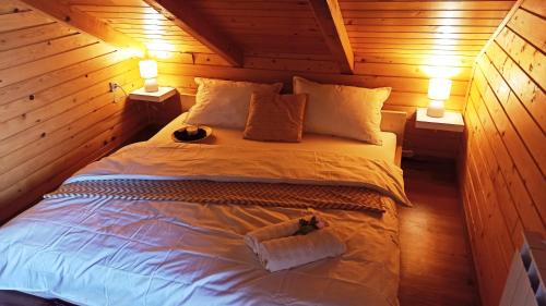 Postel nebo postele na pokoji v ubytování King's Lodge
