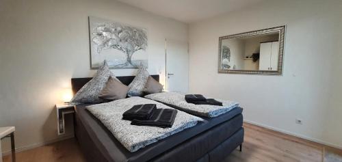 מיטה או מיטות בחדר ב-Bergliebe