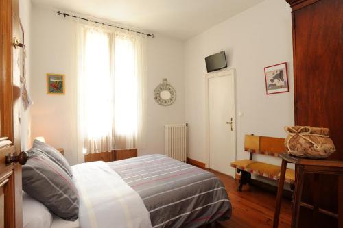 Una cama o camas en una habitación de L'Escalivade