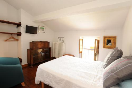 Una cama o camas en una habitación de L'Escalivade