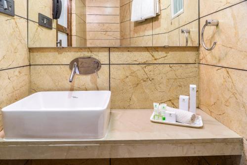 Koupelna v ubytování Super Inn Armoise Hotel