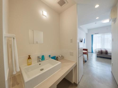 A bathroom at BiBi Hotel NAHA KUME