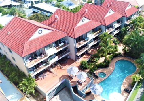 an aerial view of a house with a swimming pool at Montana Palms Resort in Gold Coast