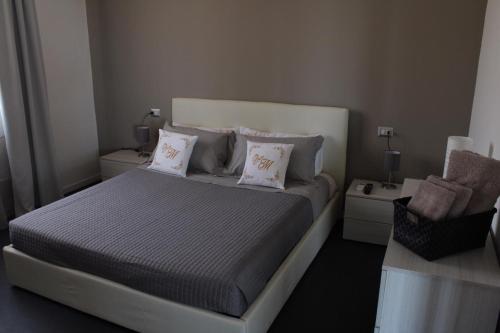 Ένα ή περισσότερα κρεβάτια σε δωμάτιο στο Villa Mida