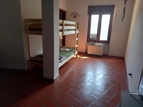 Postel nebo postele na pokoji v ubytování B&B La Forcella