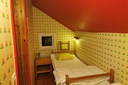 a small bedroom with two beds in it at Sågen - Great wildlife, no neighbours, large house in Särna