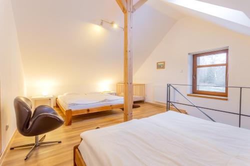 Postel nebo postele na pokoji v ubytování Apartmány no.823