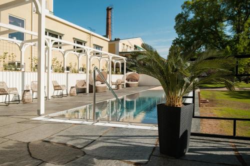 Bazén v ubytování Badhotellet Spa & Konferens nebo v jeho okolí