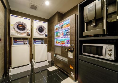 Kuchyň nebo kuchyňský kout v ubytování APA Hotel Hakata Ekimae 3Chome