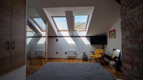 Posteľ alebo postele v izbe v ubytovaní Apartament Rynek 22 Krosno