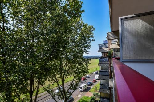 a view of a street from the balcony of a building at Domicile Cologne in Cologne
