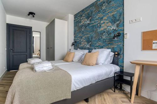 Postel nebo postele na pokoji v ubytování Hosted by Wendy Prins Willem 3