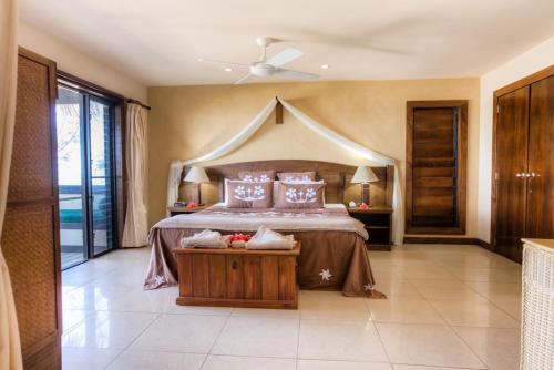 Postel nebo postele na pokoji v ubytování Rendezvous Villas