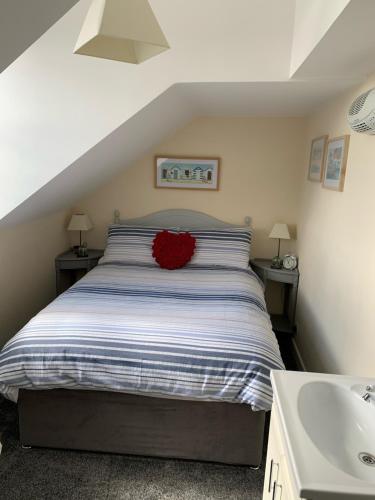 Ένα ή περισσότερα κρεβάτια σε δωμάτιο στο Letchworth Guest House