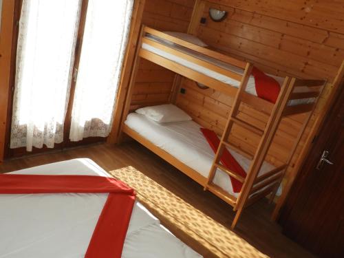 Postel nebo postele na pokoji v ubytování Manoir 2