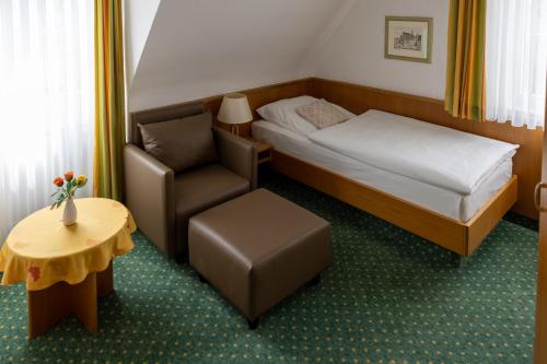Voodi või voodid majutusasutuse Hotel Garni Lehrertal toas