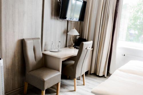 Μια τηλεόραση ή/και κέντρο ψυχαγωγίας στο Bach Hotel