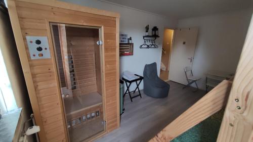 a view of a living room with a sliding glass door at Chill & Party in Breda