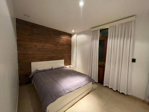 Кровать или кровати в номере Patio del Puerto Hotel Boutique