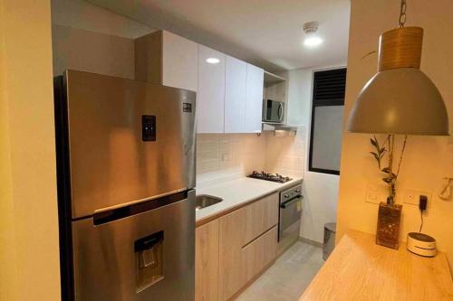 Kuchyň nebo kuchyňský kout v ubytování Cómodo apartamento con excelente ubicación