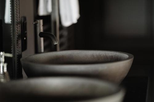 a sink with a faucet in a bathroom at Maison Durieux in Limoges