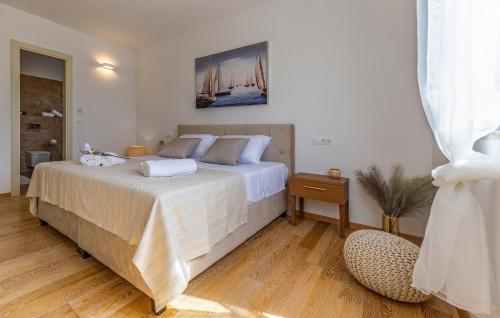 Un pat sau paturi într-o cameră la Paradiso Luxury Apartment, Rovinj