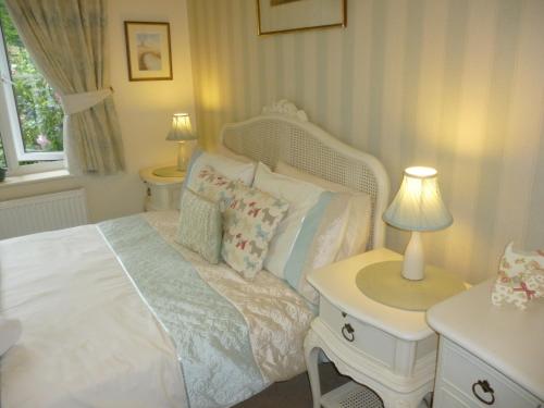 Katil atau katil-katil dalam bilik di Copperfields Guest House