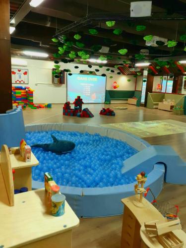a room with a pool of water in the floor at Family Resort Urania in Baška Voda
