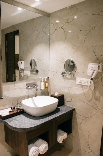 Ванная комната в Playotel Premier Vijay Nagar