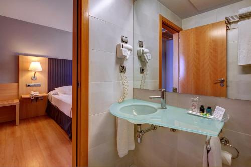 Ett badrum på U Hotel Villa-Gomá