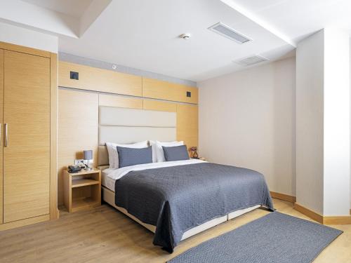 Ένα ή περισσότερα κρεβάτια σε δωμάτιο στο Merlin Hotel İstanbul