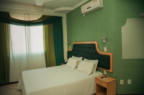 Ліжко або ліжка в номері Hotel Meri